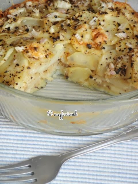 BAKED LAYERED POTATOES IN SOUR CREAM